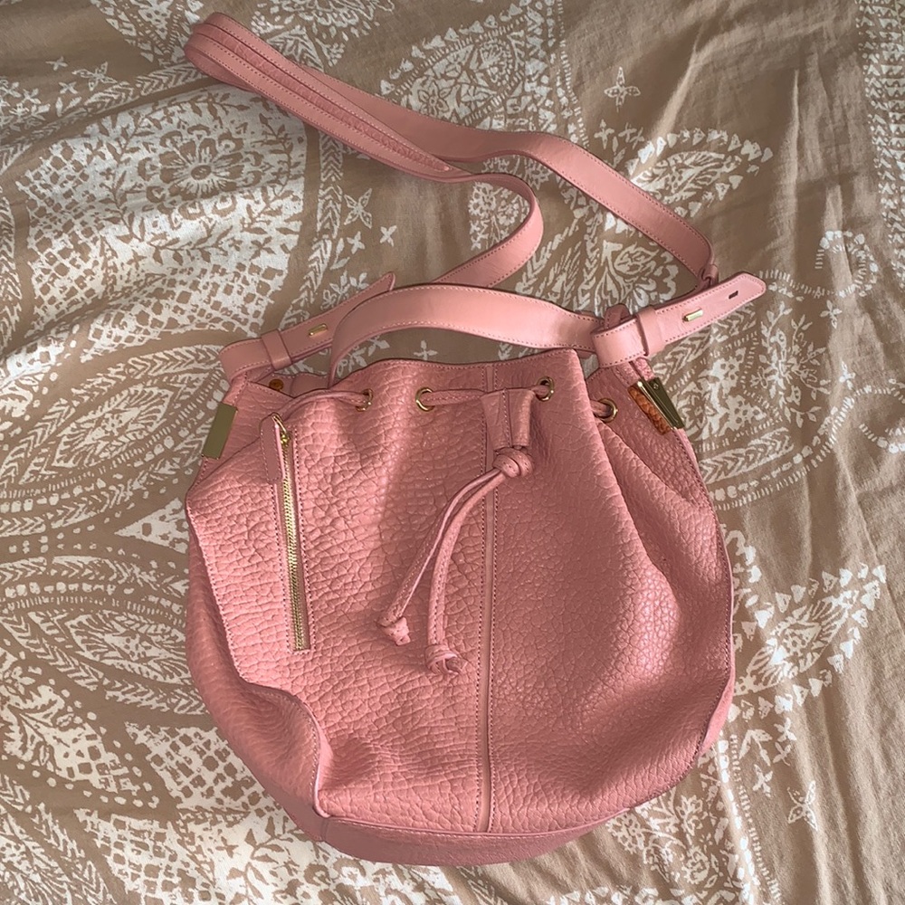 Pink Time’s Arrow Leather Crossbody